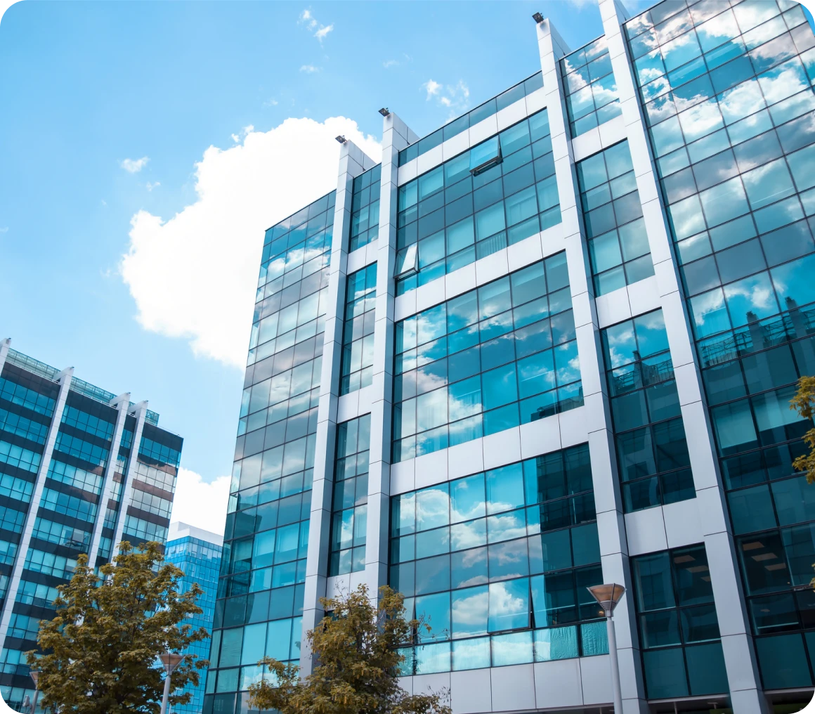Office building reflecting clouds